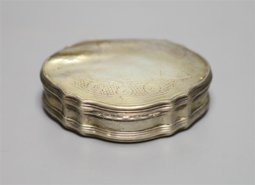 An early 19th century white metal and mother of pearl mounted cartouche shaped snuff box, 72mm, unmarked,